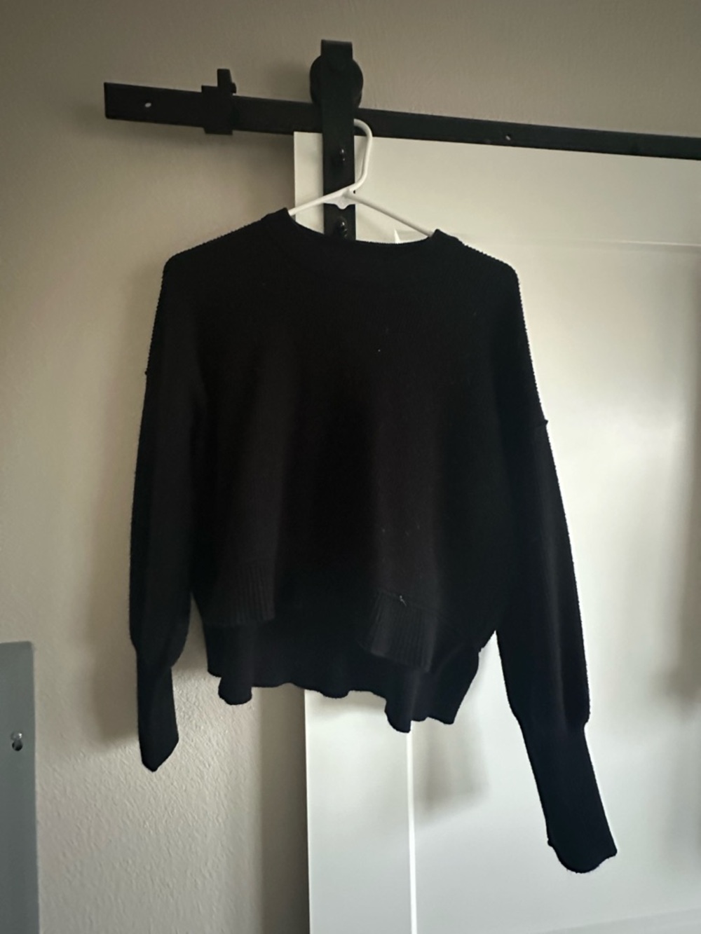 Classic Black Women's Crewneck Sweater cropped in front longer in back